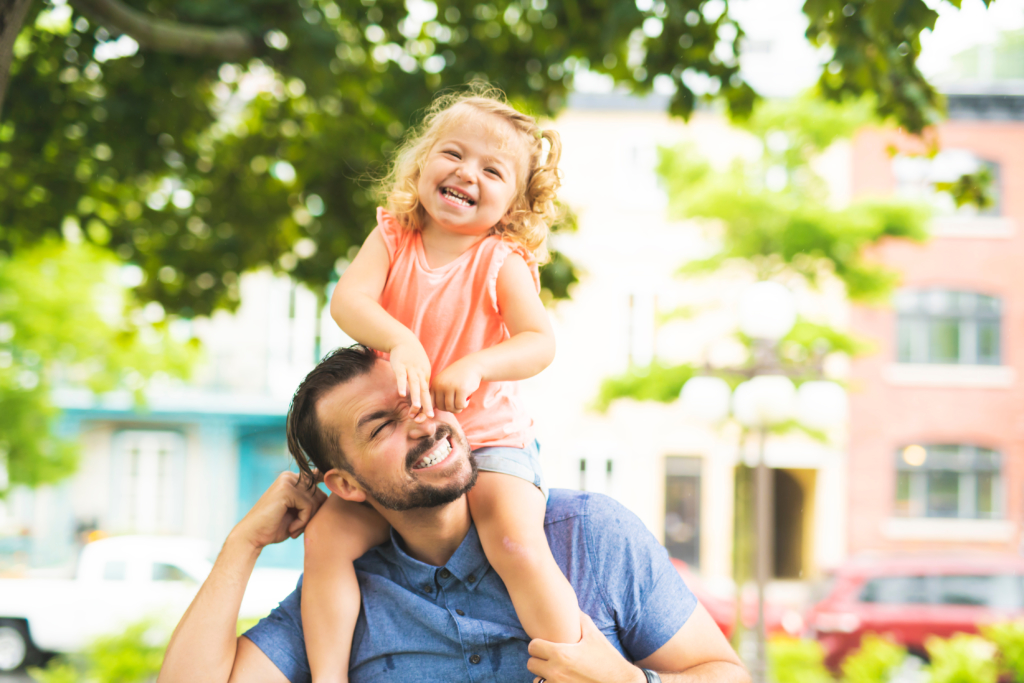 Father and daughter enjoying a day in the park