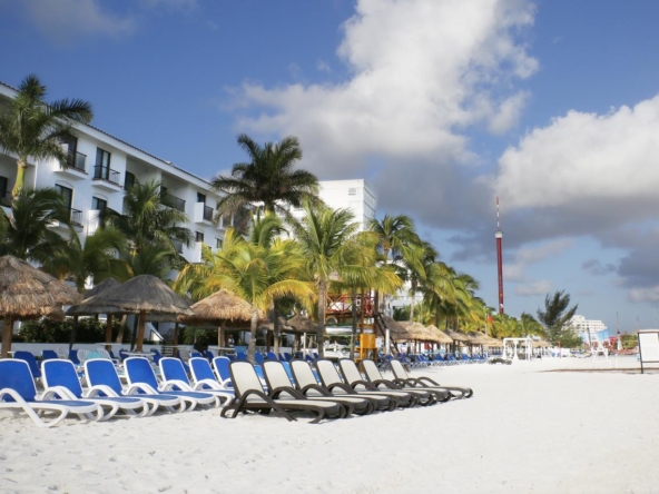 Royal Cancun beach lounge area with lounge chairs