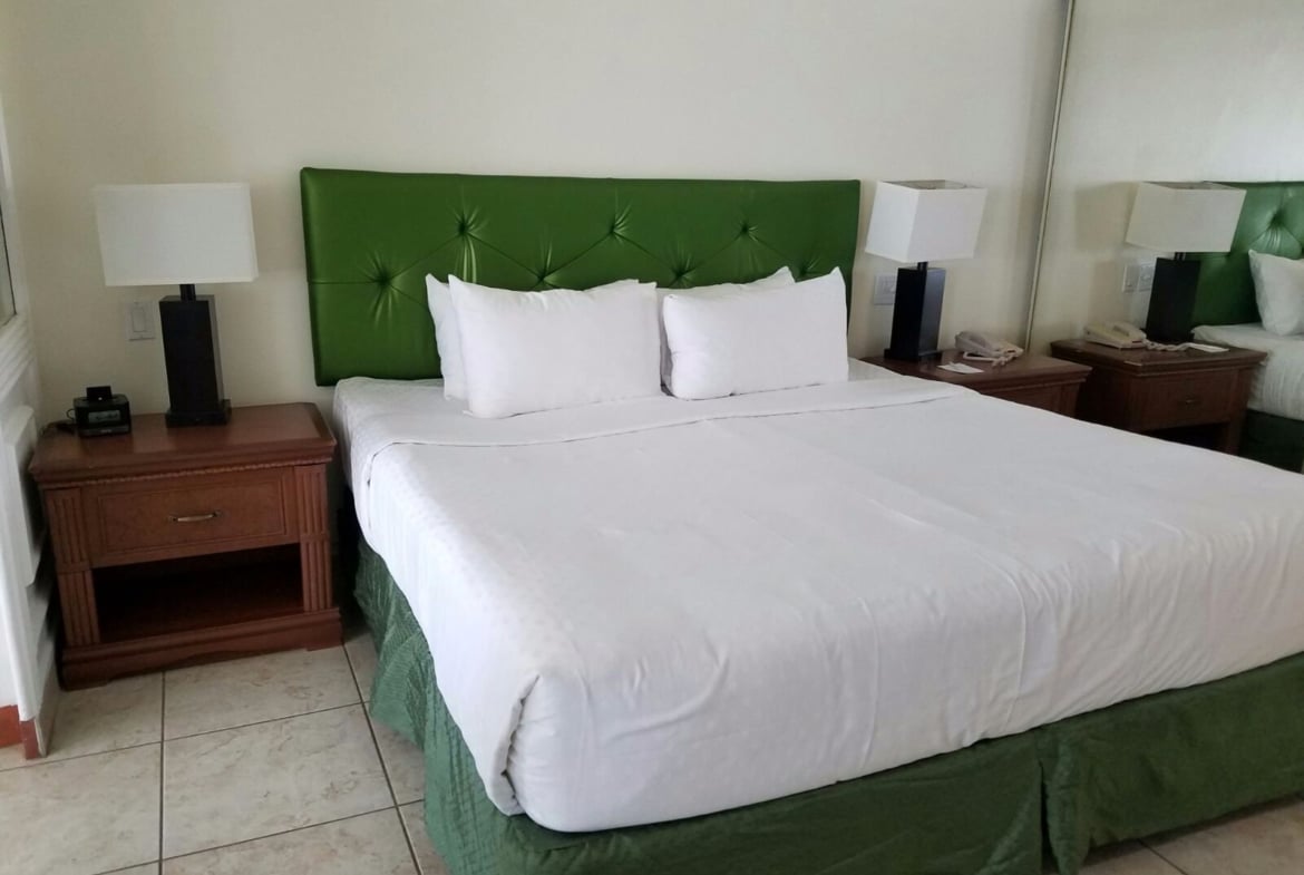 Diamond Flamingo Beach Resort Bed Area