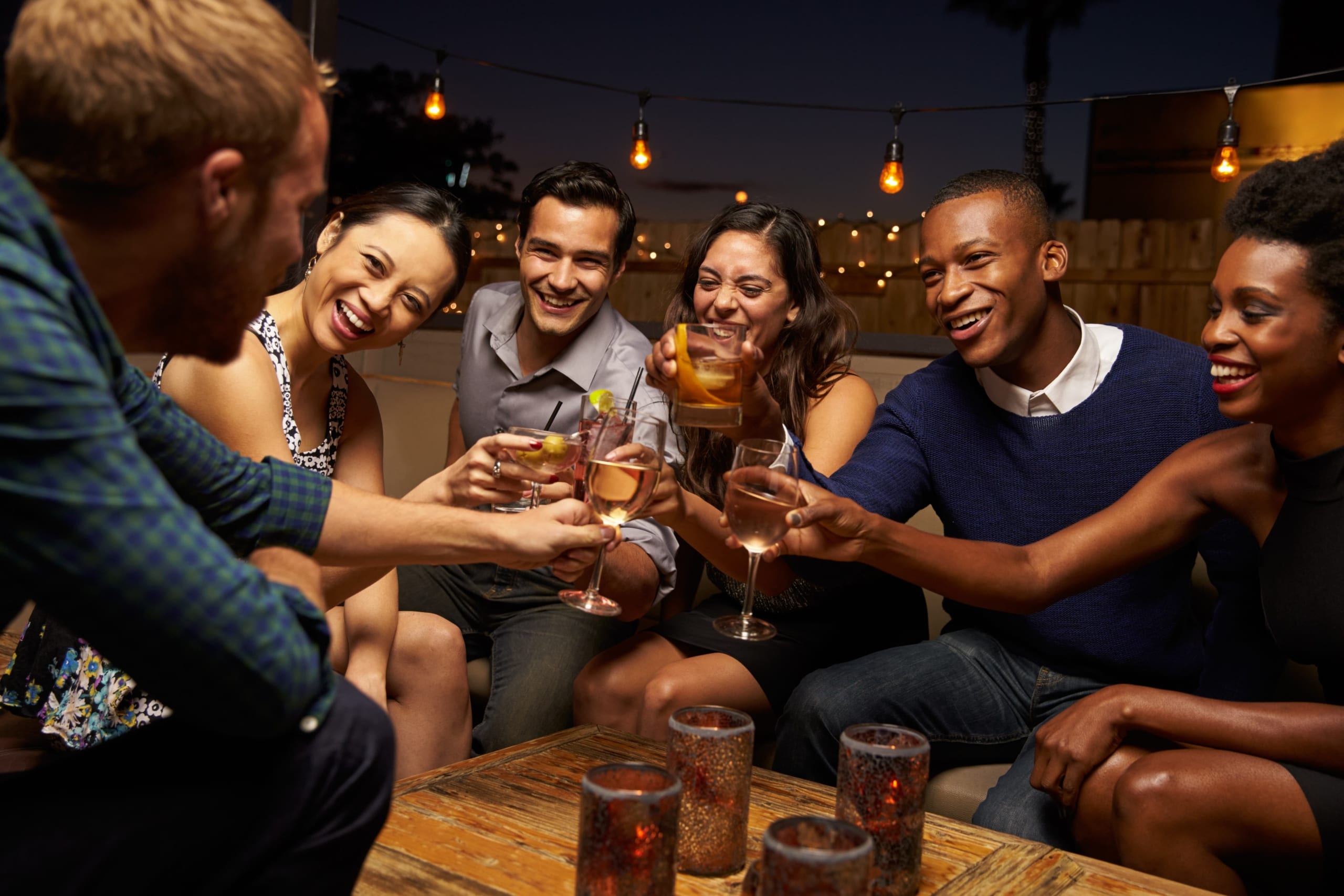 Friends Toasting At Bar