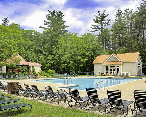 Attitash Mountain Town Pool with a horse drawn carriage ride